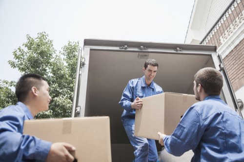 Desks and filing cabinets arranged for a smooth office move in Wapping